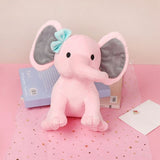 elephant-en-peluche-rose