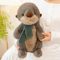 jouet-peluche-loutre-echarpe-chaude