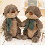 peluche-loutre-echarpe-douce-mignonne