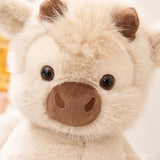 peluche-vache-highland-qui-court-gros-plan-visage-adorable