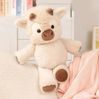 peluche-vache-highland-qui-court-beige
