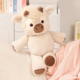 peluche-vache-highland-qui-court-beige